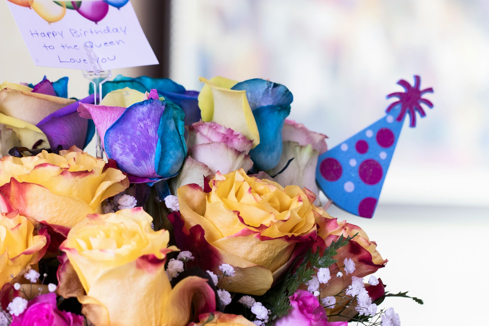 yellow blue and purple flower bouquet